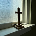 interior cross on windowsill 2025  Sherman.jpg