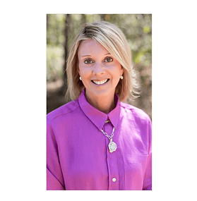 Portrait of Wendy Littlefield outdoors, smiling and wearing a bright pink blouse.