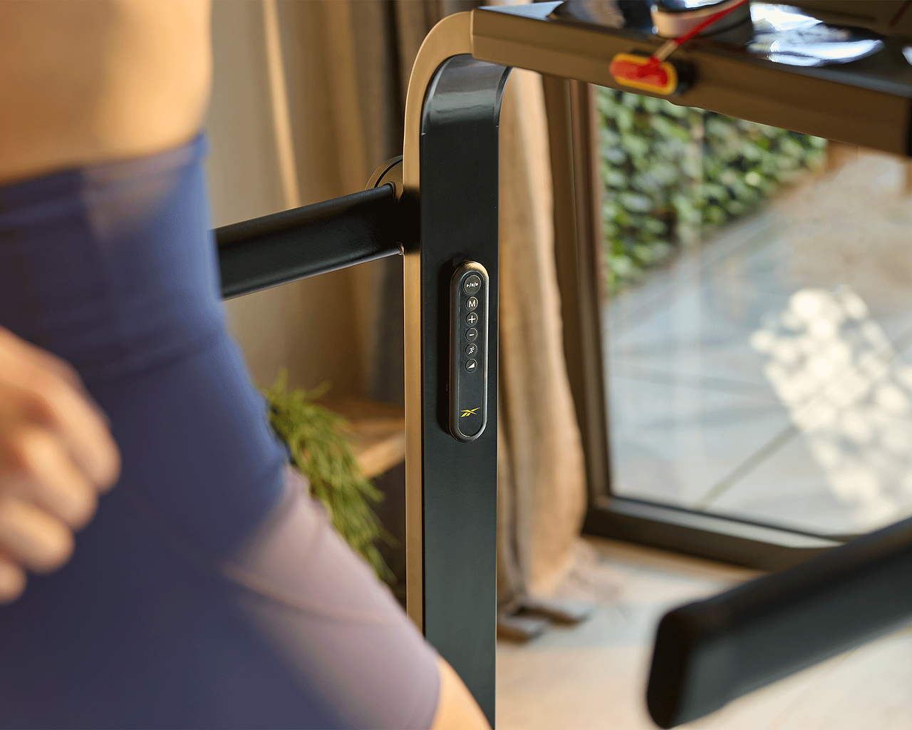 included remote magnetically attached to the arms of the Reebok i-Run 4.5 Treadmill