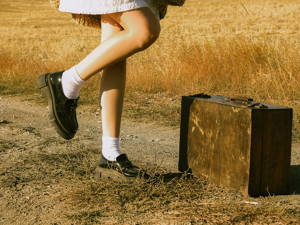 Black leather loafers with white socks