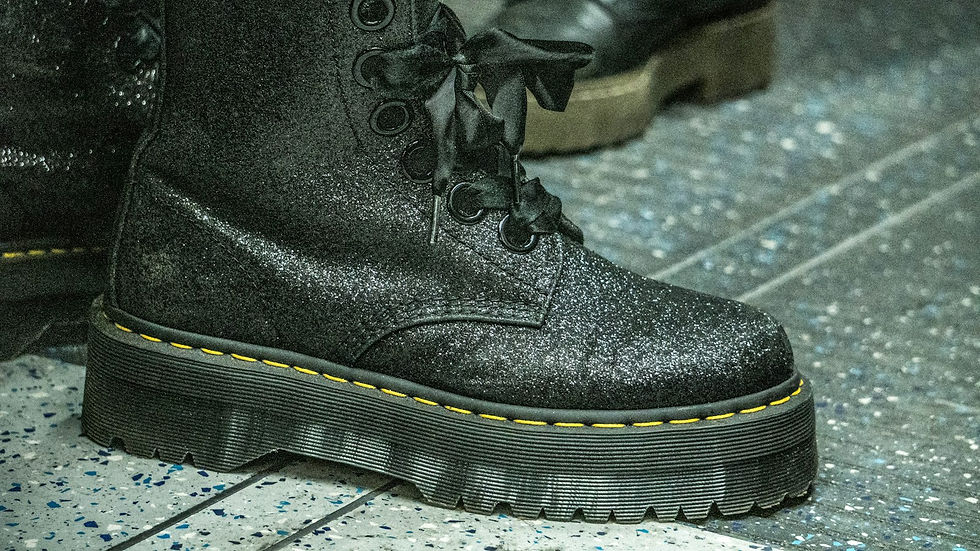 Black leather lace-up boot