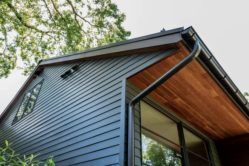 Home with dark charcoal siding