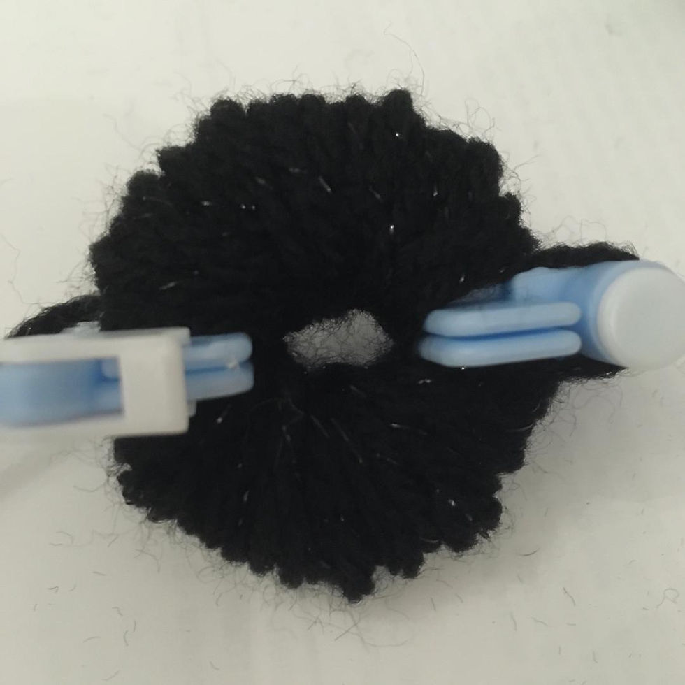Thumbnail: Black Sparkle Pom Making