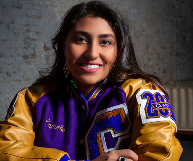 a warm and engaging portrait of a high school senior show casing confidence