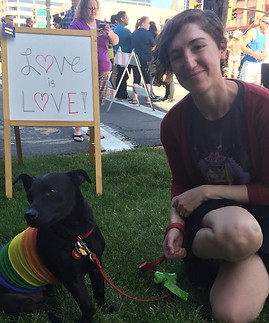 Scarlet Spark's Program Director with Franklin the dog.