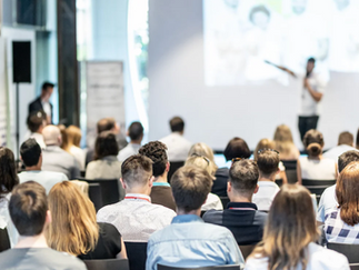 Ophthalmology conference atendees during a presentation.