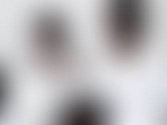 A serene image of a woman touching her glowing skin with confidence, representing clarity, skincare truth, and wellness.