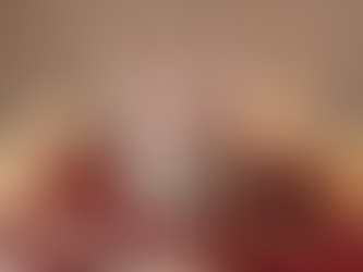 Woman gently applying skincare products while enjoying a self-care routine in a calm and relaxing environment.