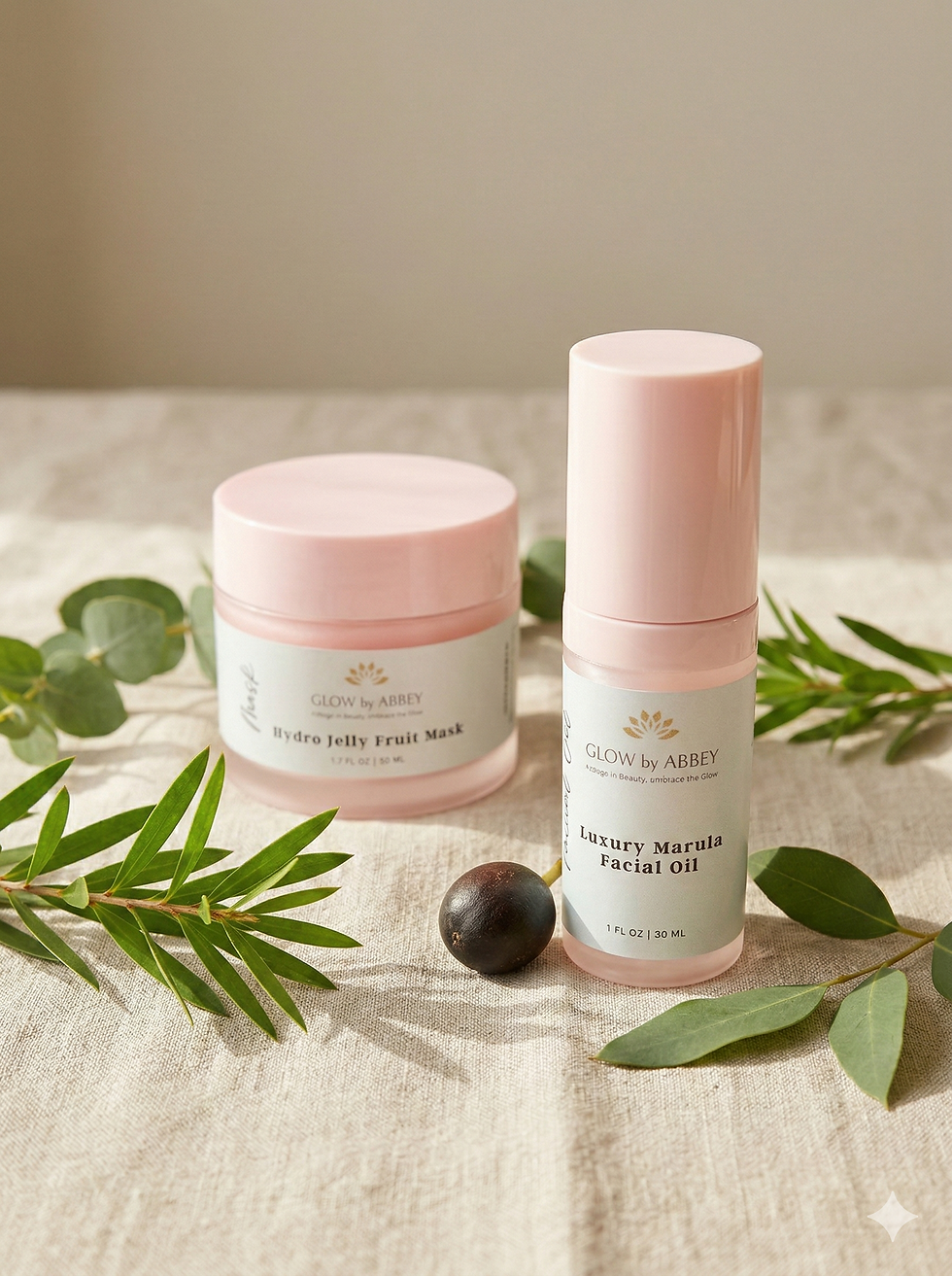 Glow by Abbey skincare products arranged neatly on a clean surface with soft natural lighting, highlighting healthy glowing skin essentials.