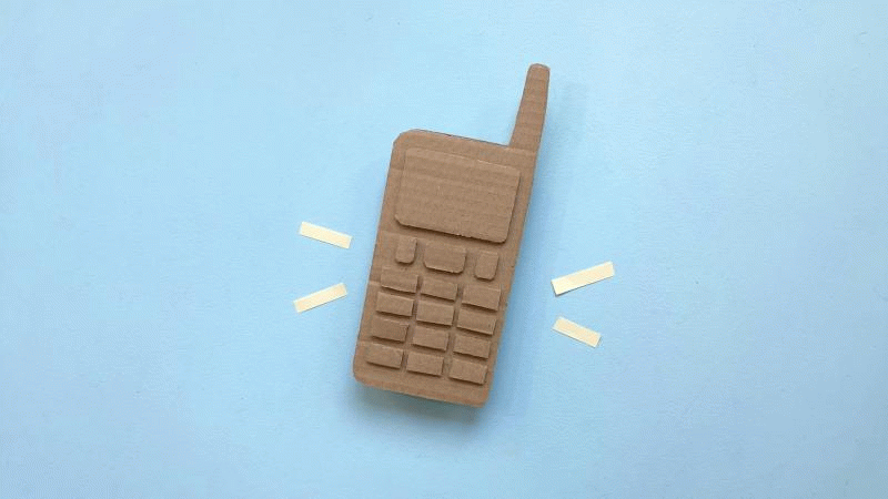 GIF eines klingelnden Handys aus Pappe