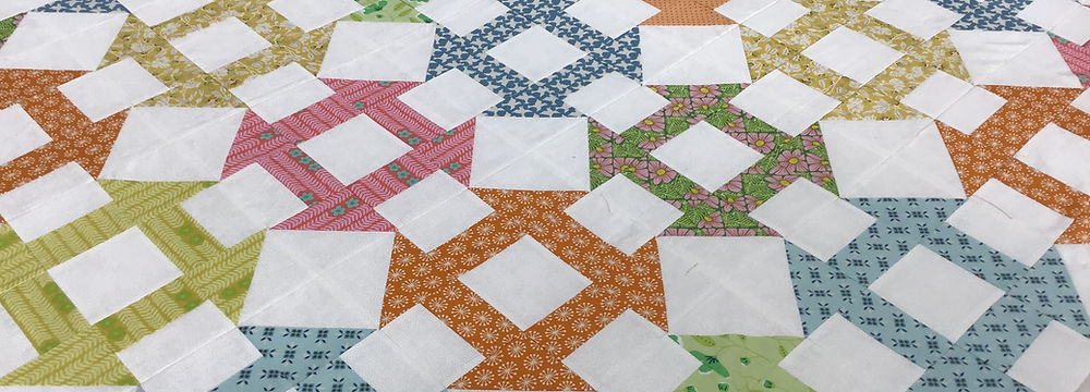 Pink and green nine-patch quilt - perfect project for this beginners patchwork workshop