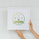 Mockup of framed wall art for Two Tales Editing