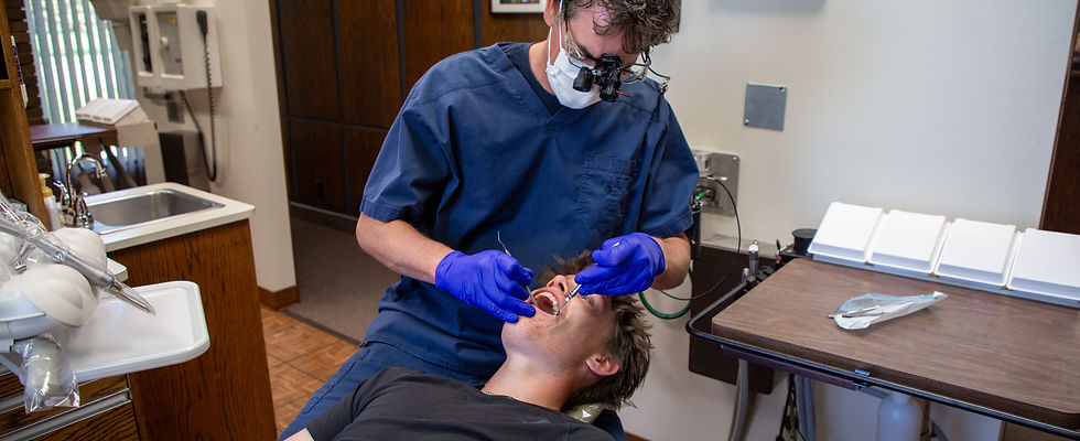 Dr. Robert Remmick with patient at Remmick Family Dentistry Dentist in Devils lake ND