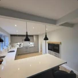 Kitchen island and worktop under pendant lighting