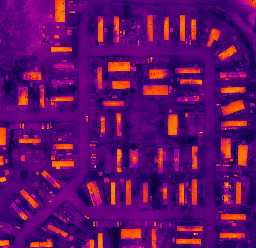 Thermal image of manufactured homes with a lot of heat escaping from the roofs.