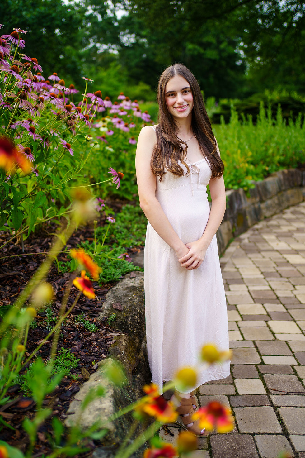 Senior in flower field