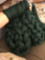 arm knitting blanket.jpeg