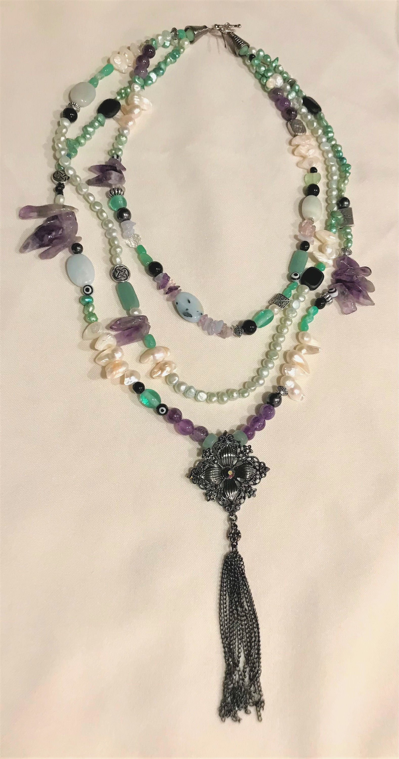 Item #897 –   Multi-strand,  with variied sized sea foam, white and ...