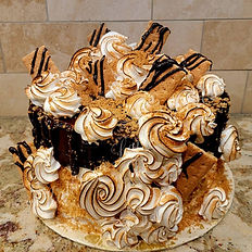  Sophisticated flavor profiles using classic cake bases, gourmet fillings, fresh fruits, mousses, truffles, and preserves, enhance cakes with infused simple syrups, including liquor-based options, and explain how to properly work with bakery-style stabilized whipped cream.