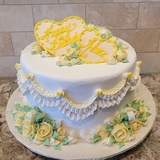 Vintage Lambeth birthday cake with buttercream frosting and roses. Basic cake decorating class 101 with Kathleen Lange of Confectionary Chalet