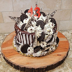  Sophisticated flavor profiles using classic cake bases, gourmet fillings, fresh fruits, mousses, truffles, and preserves, enhance cakes with infused simple syrups, including liquor-based options, and explain how to properly work with bakery-style stabilized whipped cream.