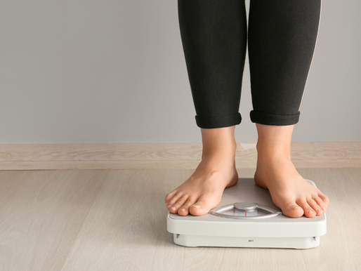 Women standing on scales
