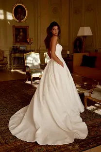 Back view of Jordan wedding dress with elegant chapel-length train