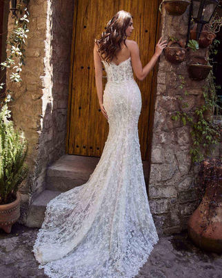 Klara
Style No. 125253
Strapless or Long Sleeve Wedding Dress with Lace and Sheath Silhouette
Colors
Ivory/Light Nude (Pictured), Ivory/Ivory

Fabric
Lace, 3D Lace

Silhouette
Sheath

Neckline
Sweetheart, Off the Shoulder, Strapless

Sleeves
Off the Shoulder, Long Sleeves, Strapless/Sleeveless, Detachable Sleeves

Accessories (May Be Sold Separately)
Matching Veil, Detachable Sleeves

Style
Romantic, Vintage, Floral, Rustic, Beach/Destination

Size
0-24