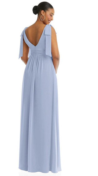 This stunning sleeveless gown has an elegant, timeless silhouette. A dramatic plunge neckline bodice features removable shoulder bows. While a figure-flattering empire waist flows into a breezy full-length shirred skirt with a front slit. Designed in soft lux chiffon, this dreamy maxi dress offers a breath taking look for weddings and beyond.
Dessy bridesmaids 1569