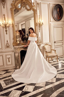 Justin Alexander Naima 88552 wedding dress, showcasing elegant designer styling, a flattering bridal silhouette and luxurious detailing, available at Ultimate Dresses bridal boutique in Claudy, Northern Ireland.