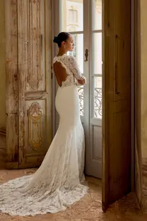 Back view of Kenya wedding dress showing elegant keyhole back and sweep-length train