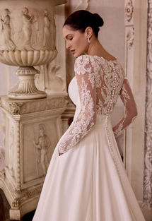 Close-up detail of the beaded back on the Lisbeth wedding dress, showcasing delicate embroidery, sequins and intricate embellishment on sheer tulle.