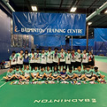 e badminton training centre team picture of champions with medals and trophies