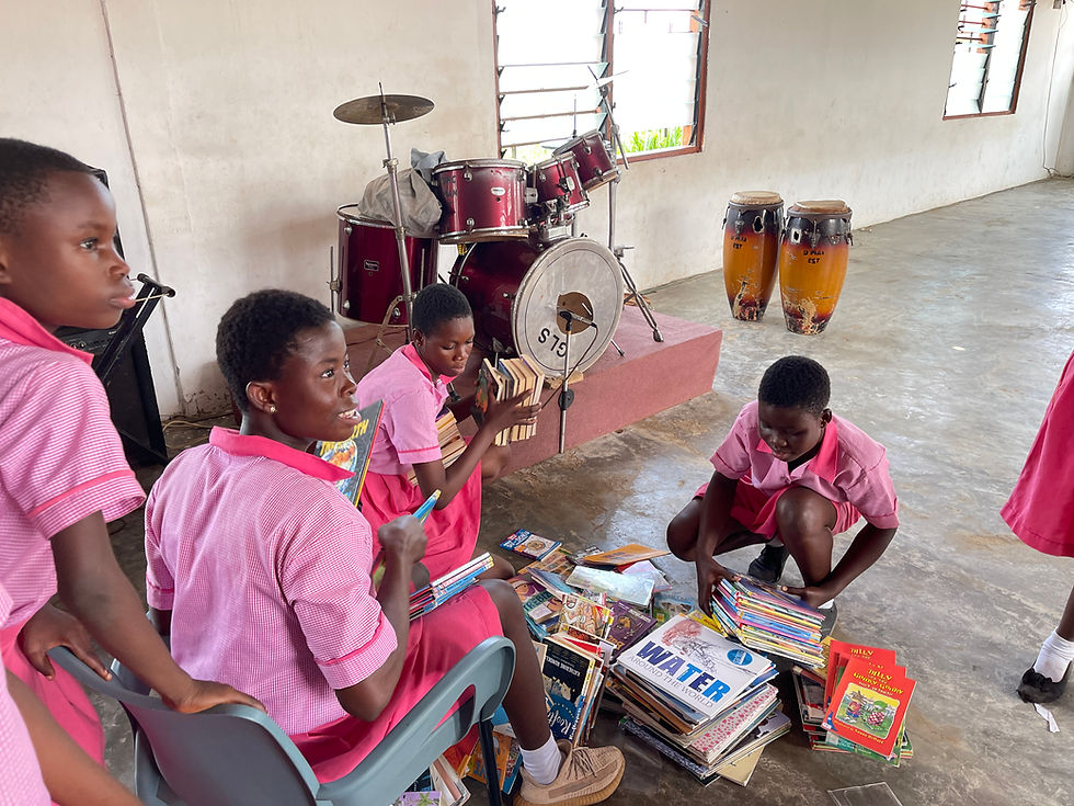 Children sorting books.JPG