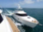 Motor yacht cruising across open water