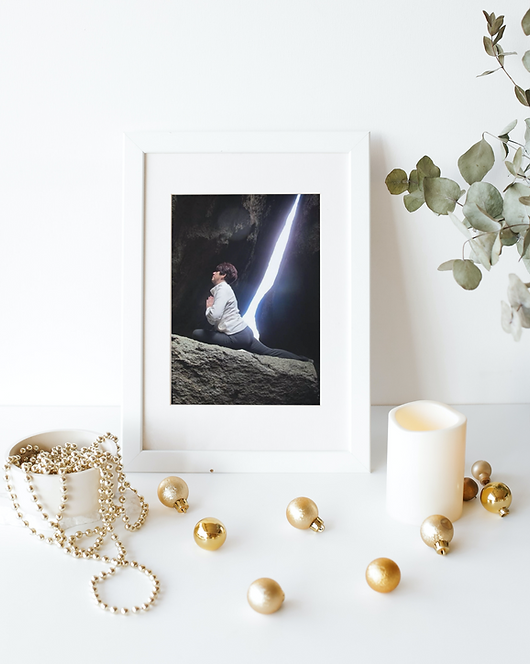 White wooden portrait frame on the desk with gold Christmas decorations_02_07_2022, 5_25_2