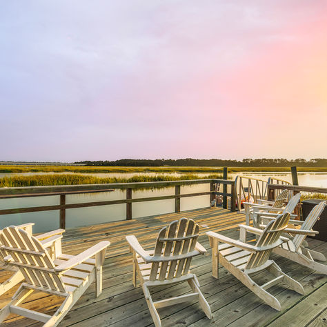 Chairs on a private dock at a waterfront home in historic Vernonburg near Savannah