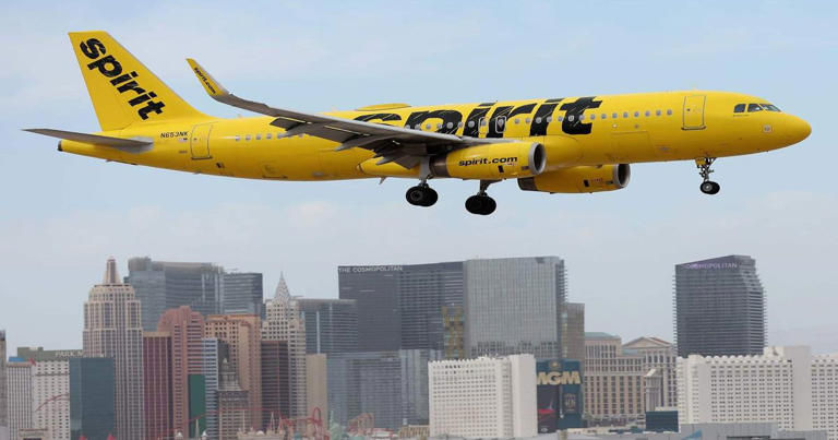 Spirit Airlines aircraft during landing, reflecting airline closure and travel industry changes
