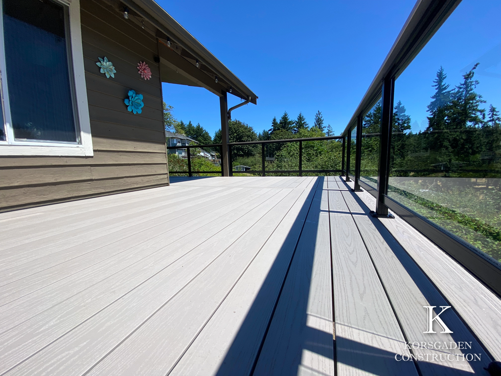 Custom-built composite decks and outdoor living spaces by Korsgaden Construction, featuring craftsmanship designed to enhance Northwest homes with style and durability.