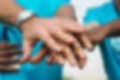 team-volunteers-stacking-hands.jpg