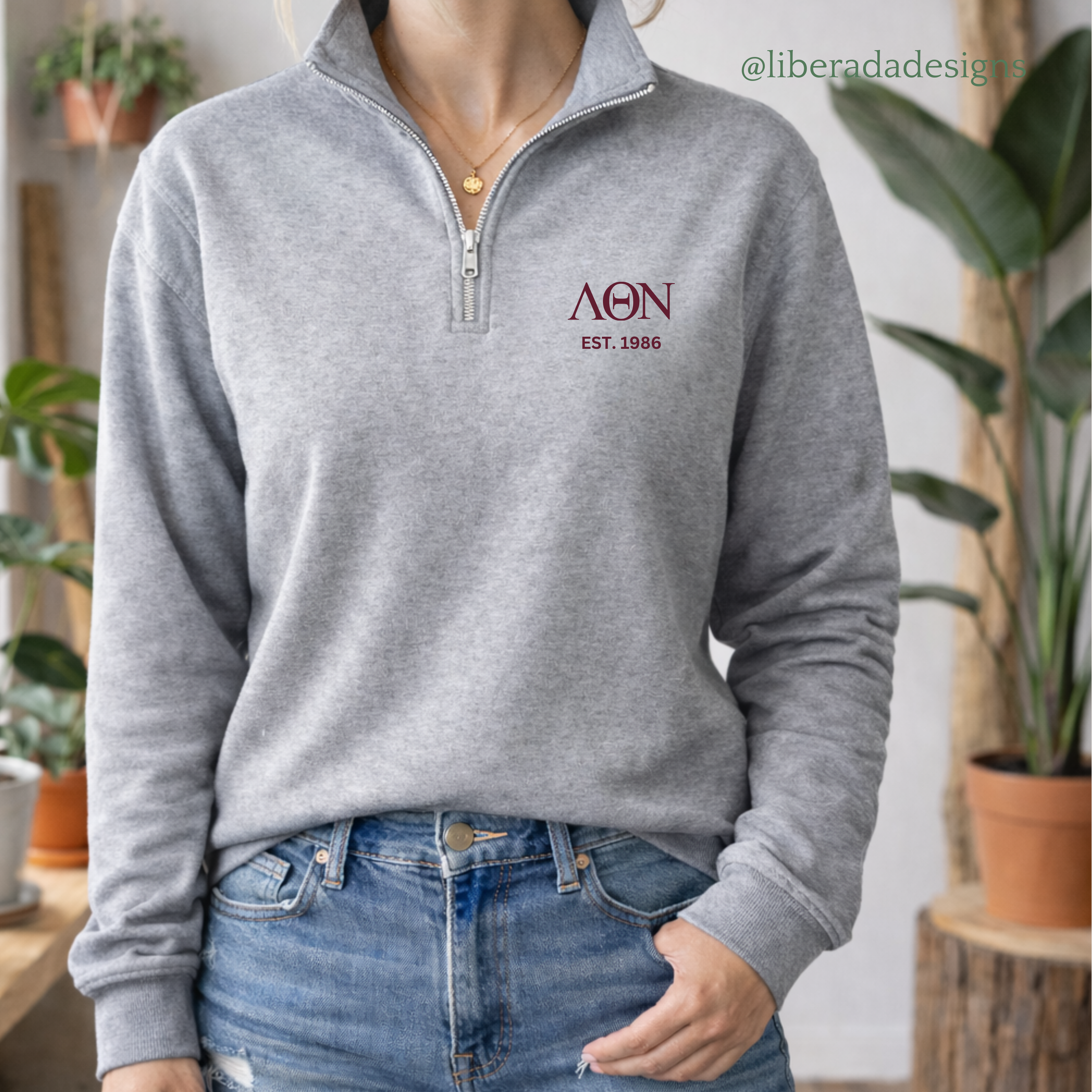 Lambda Theta Nu Embroidered Greek Letter Quarter Zip Sweater
