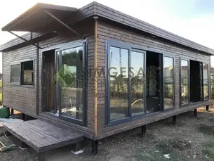 Ahşap cepheli, taş yünü izolasyonlu konteyner ev örneği