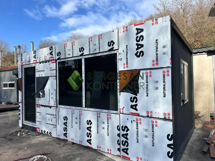 Betopan kaplamalı 3x5 güvenlik kulübesi yan cephe görünümü