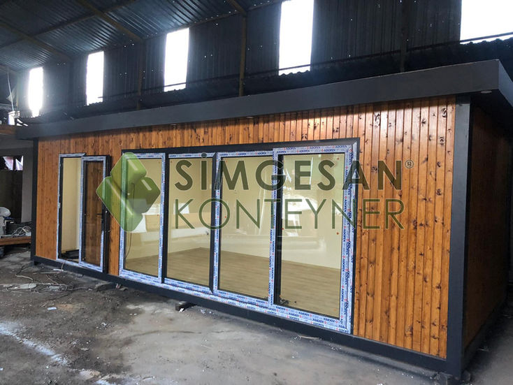 Emprenyeli ahşap kaplamalı konteyner ev görüntüsü