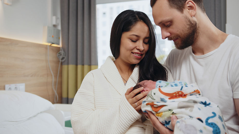 maternity-and-parenthood-concept-happy-parents-in-postnatal-hospital-with-newborn-baby-SBI
