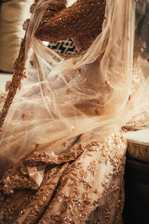 Bride in a gold dress with veil, Wedding Photography in leeds and yorkshire.