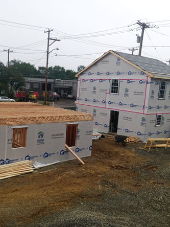 Construction of three new homes in Homewood