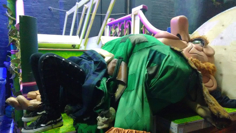 A pantomime giant costume being repaired
