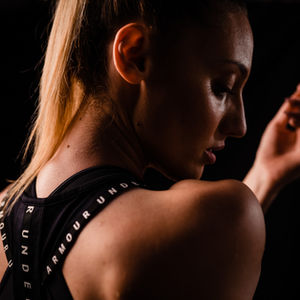 Woman in Under Armour sports bra