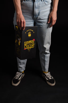 Person holding "Palace of Aisles" book